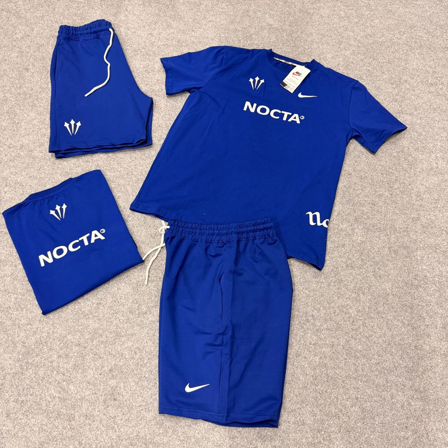 Conjunto nike nocta azul logo blanco