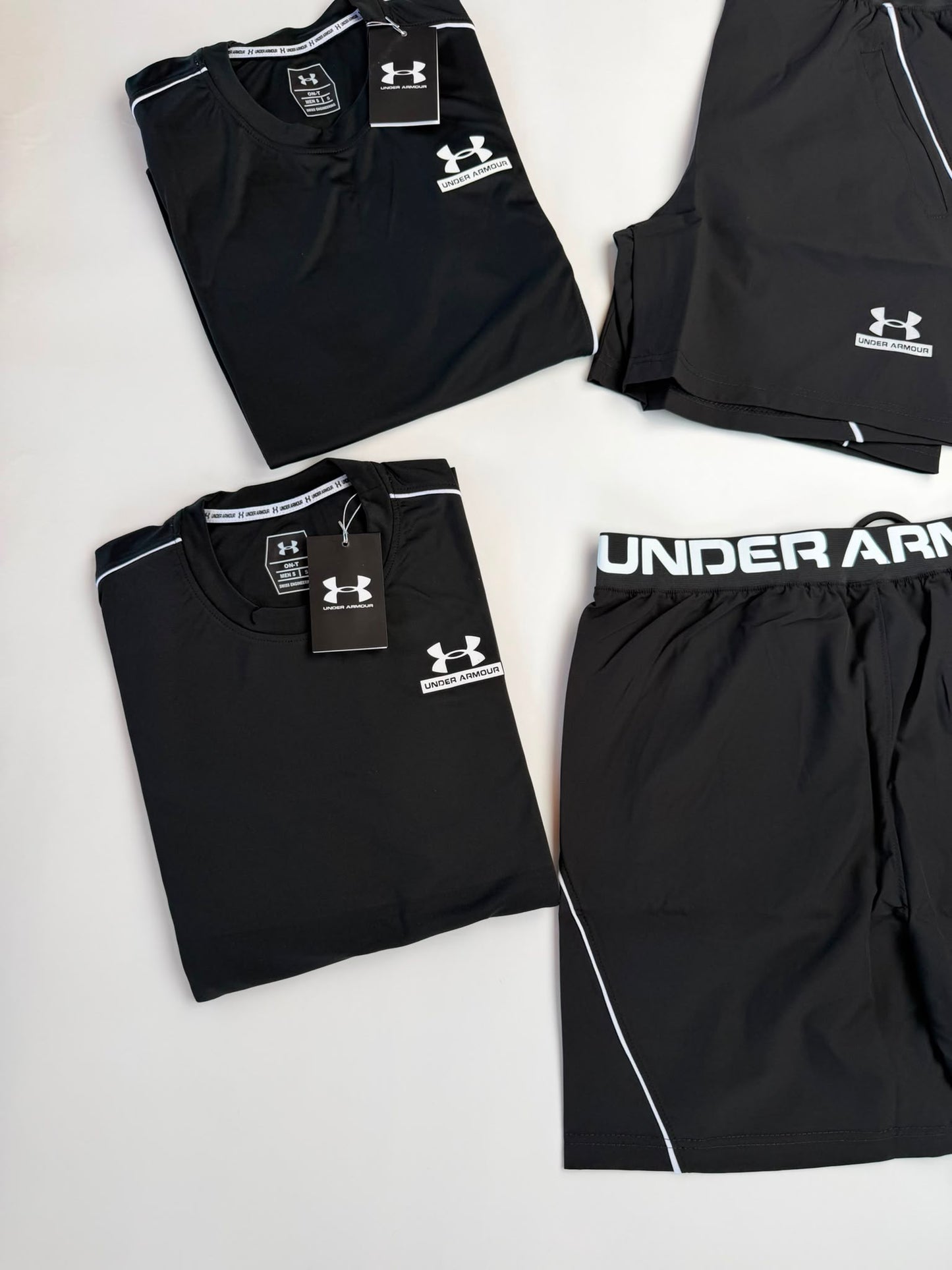 Conjunto corto under armour negro logo blanco