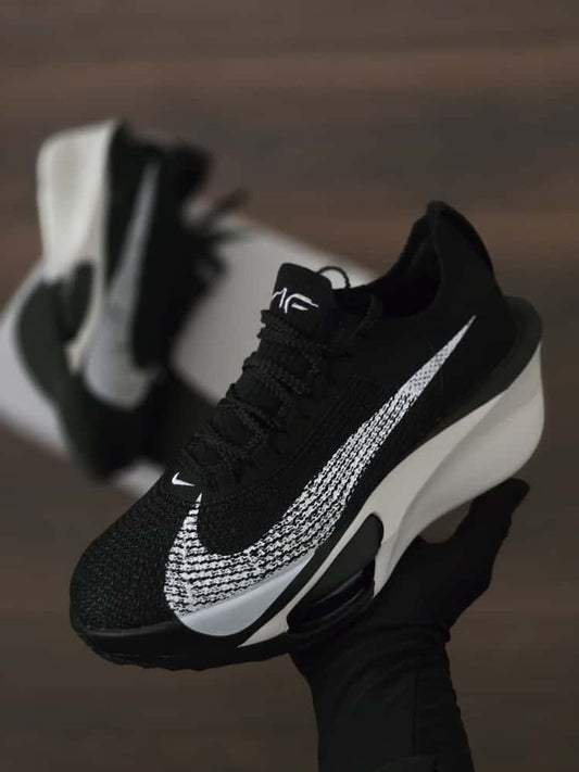 Air zoom negra suela blanca