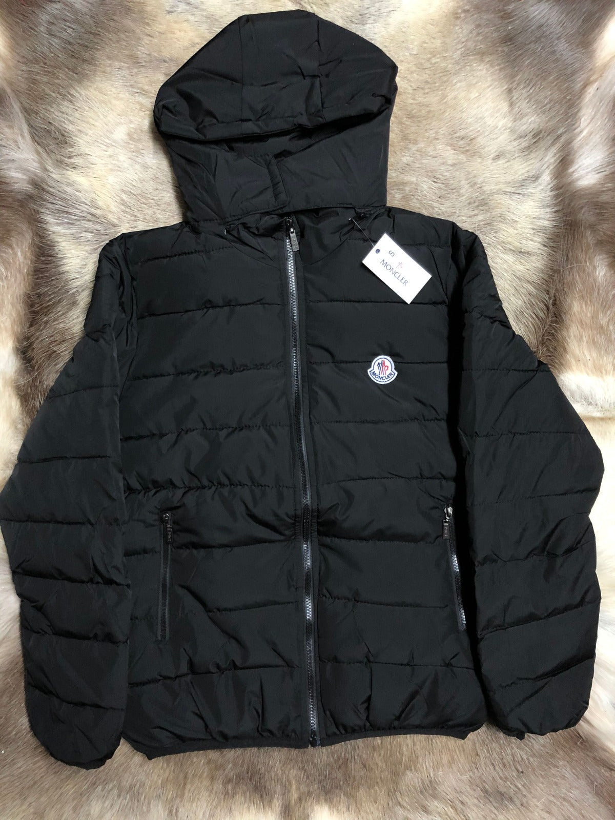 Chaqueton Moncler negro logo blanco