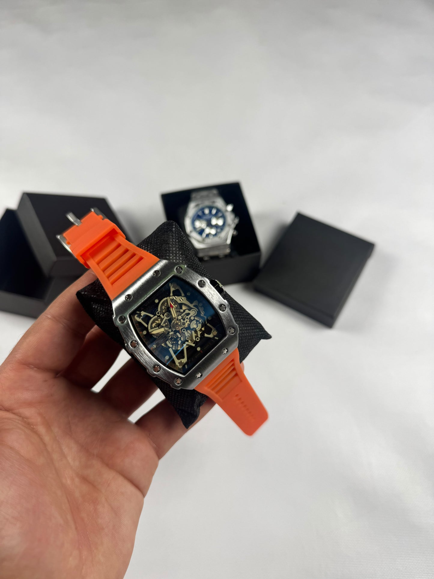 RELOJ RICHARD MILLE PLATEADOS Y NARANJAS