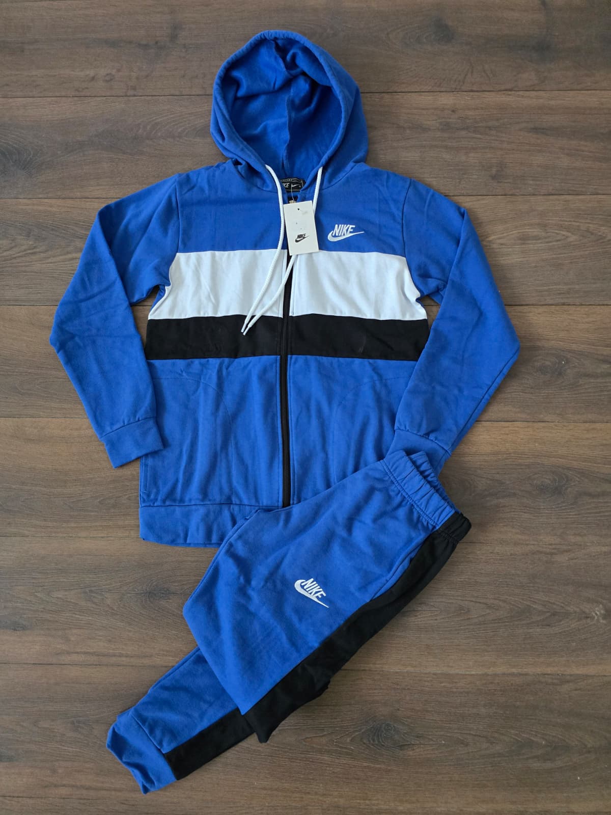 Chandal nike azul franja en medio blanca negra