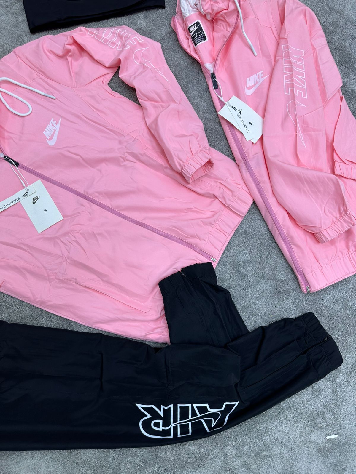 Chandal Nike rosa logo blanco