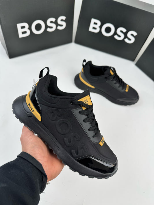 Hugo Boss negras detalles dorados
