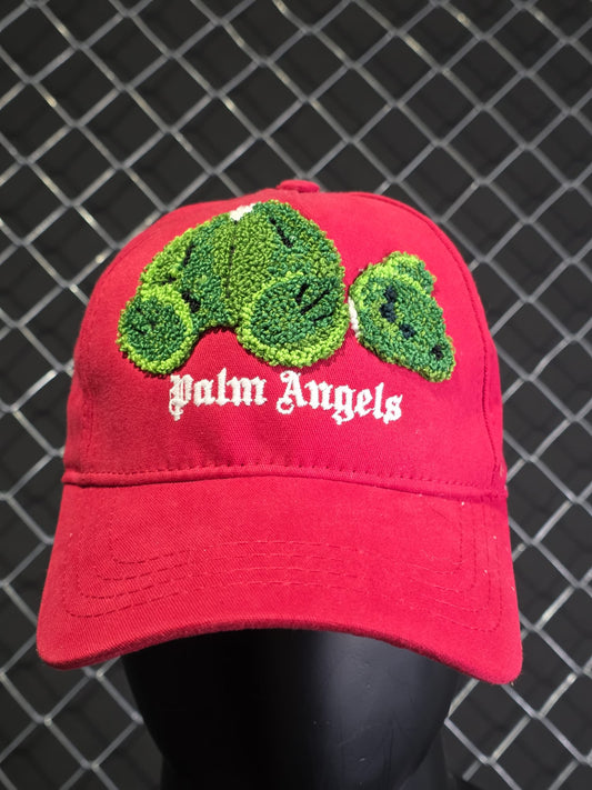 Gorra Palm Angels roja logo verde y blanco
