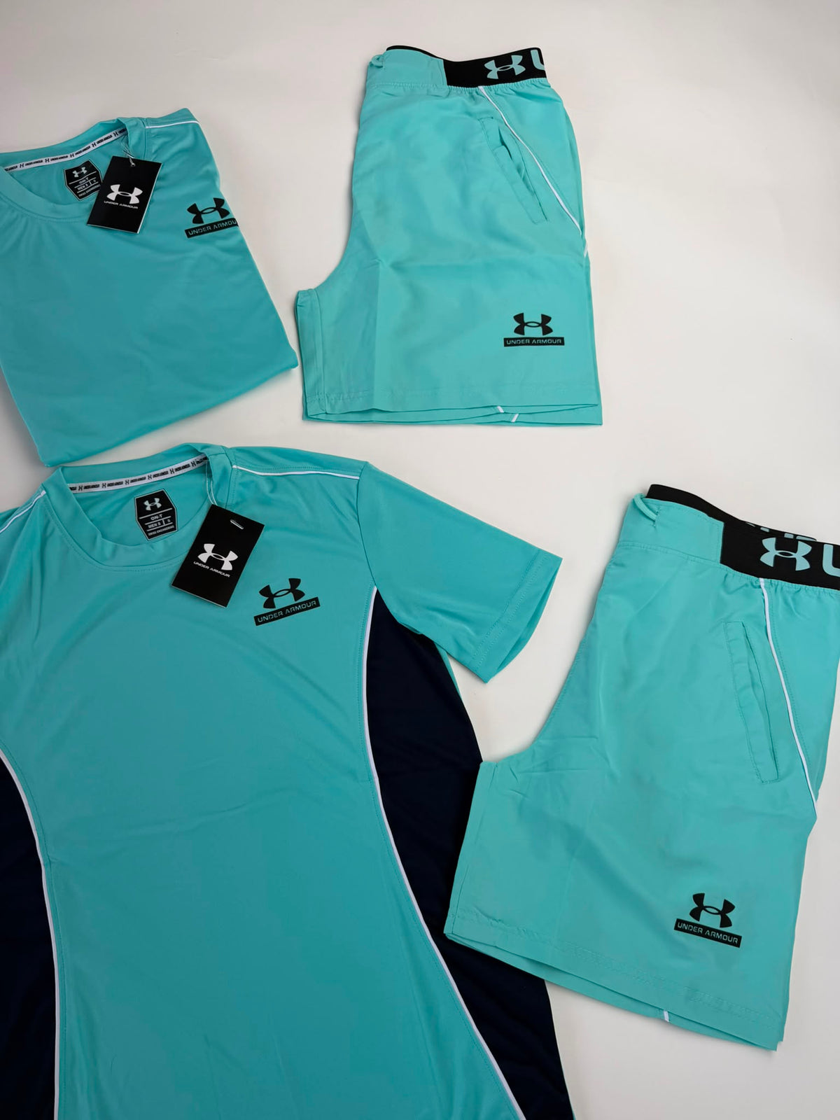 Conjunto corto under armour azul logo negro detalles negros