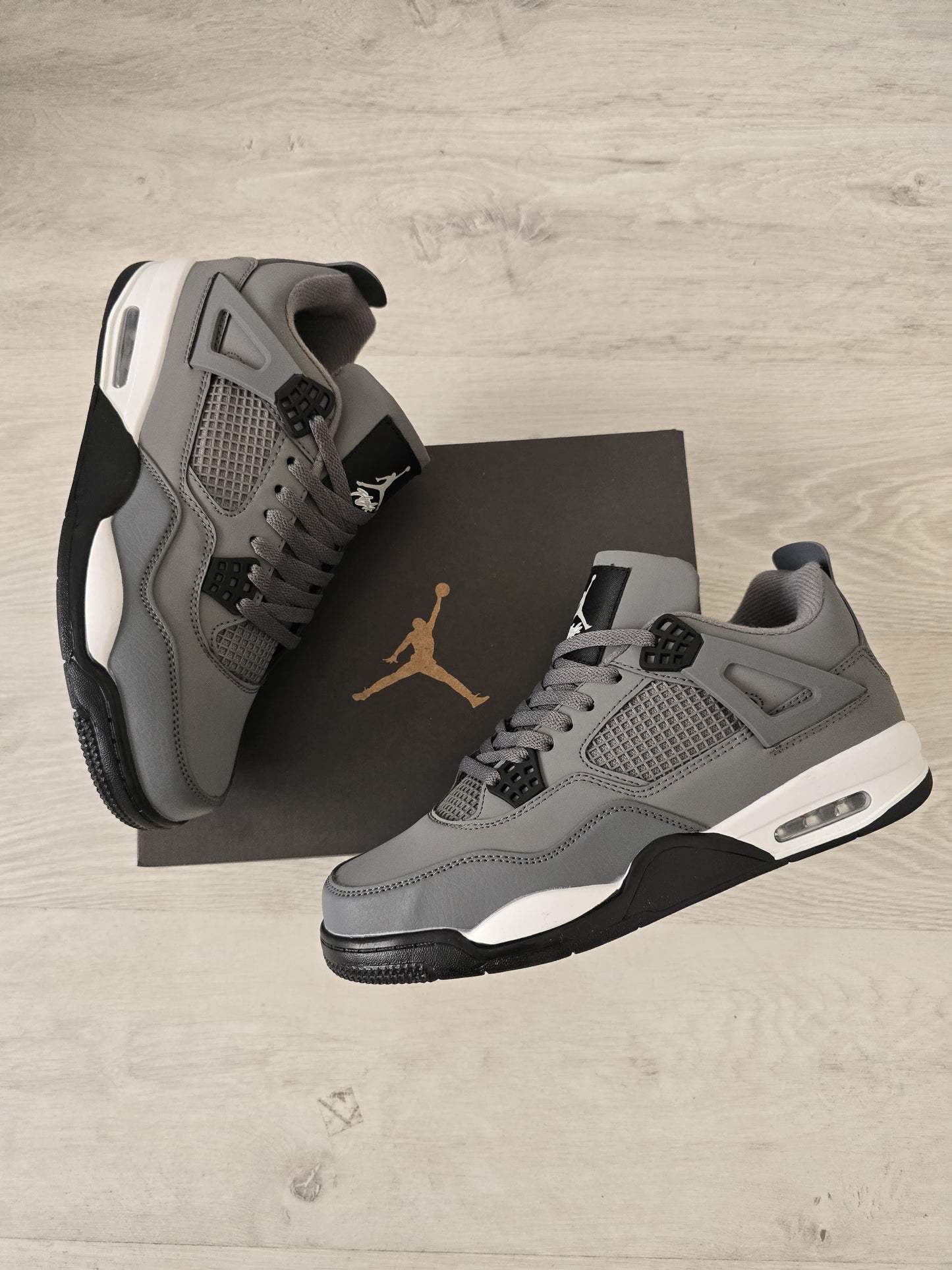 Jordan 4 gris