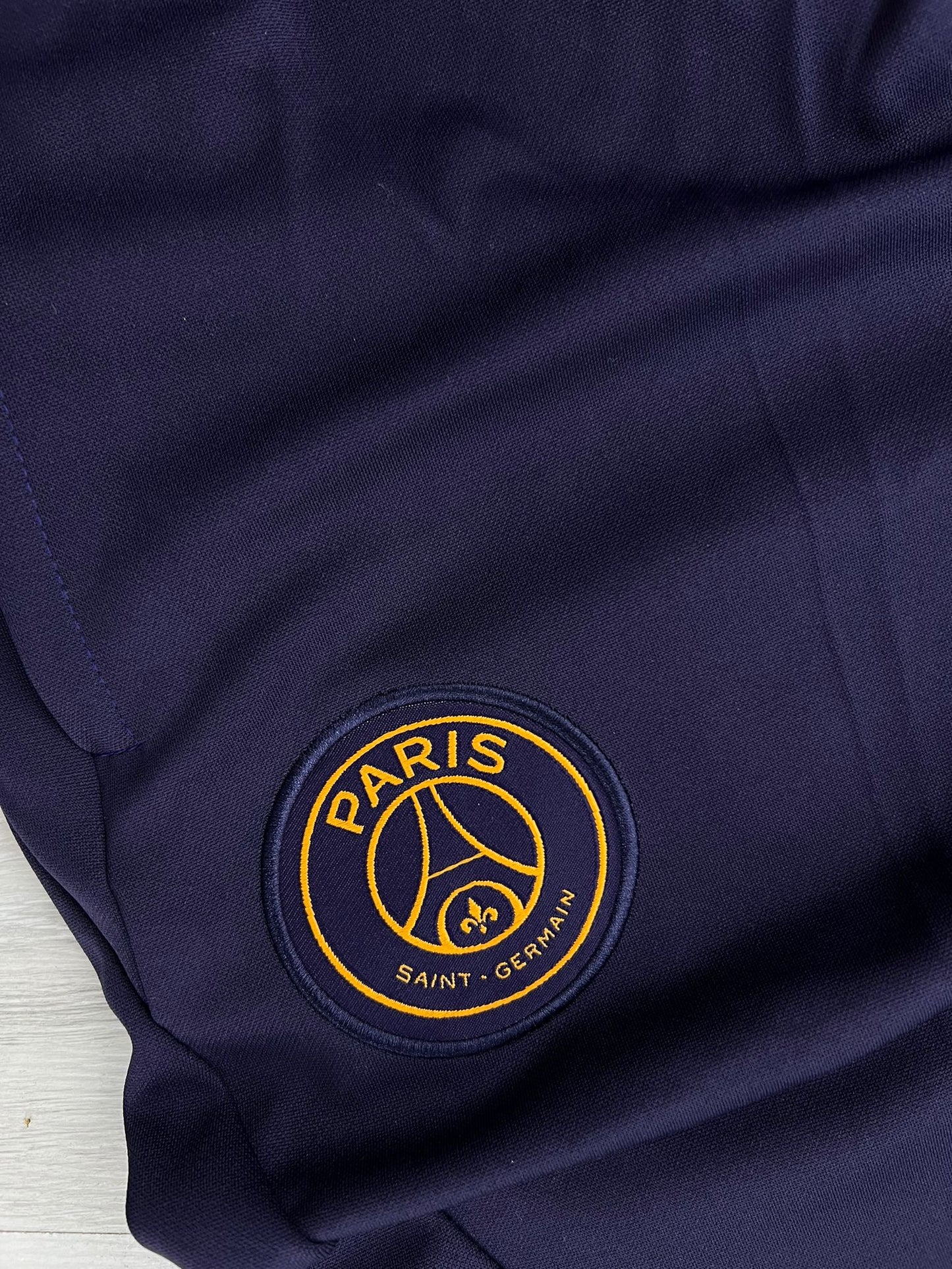 Chandal PSG azul marino y amarillo