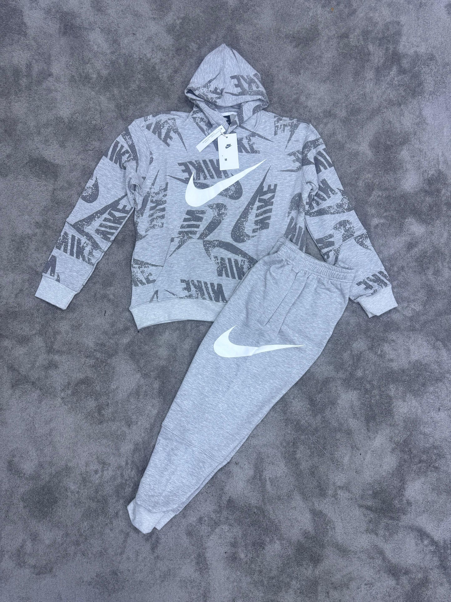 Chandal Nike gris logo blanco