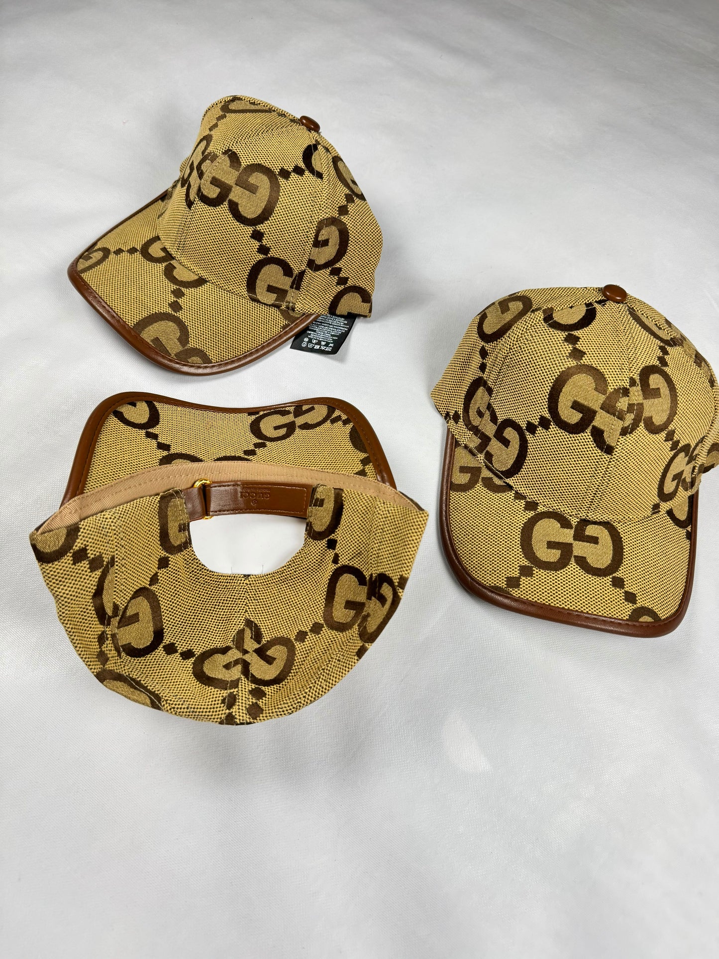 Gorra gucci dorada logo marrones
