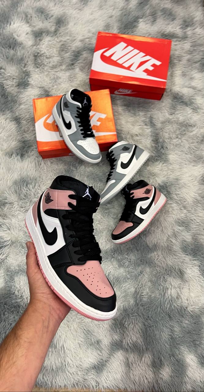 JORDAN MID 1 rosa logo negro