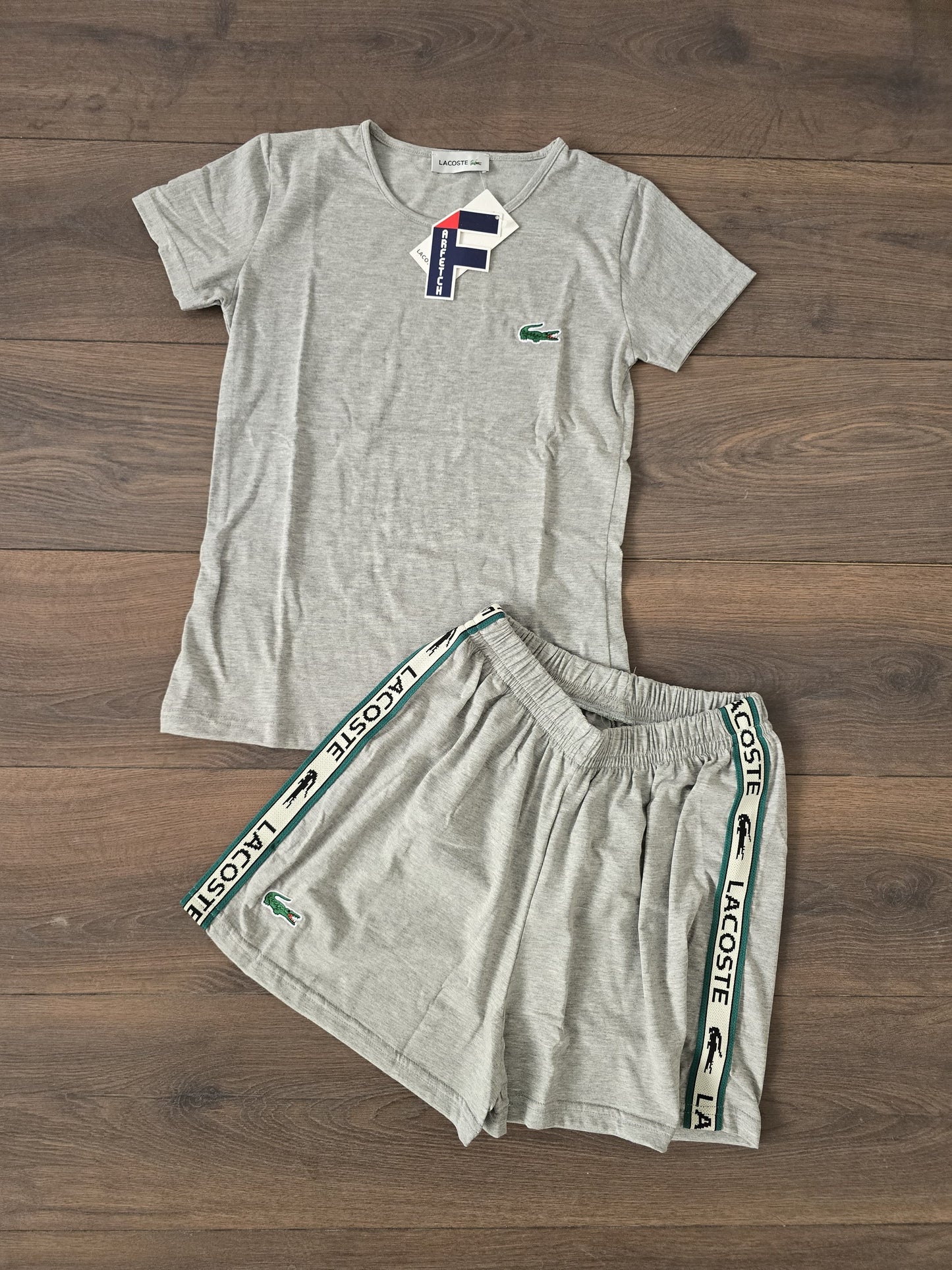Conjunto verano lacoste gris chica