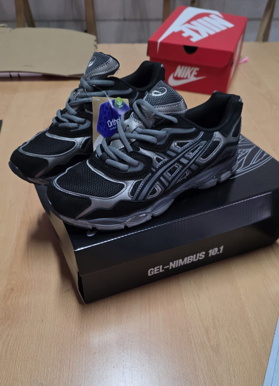 Asics negra