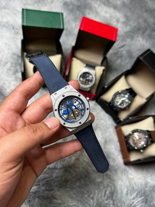RELOJ HUBLOT gris y azul marino