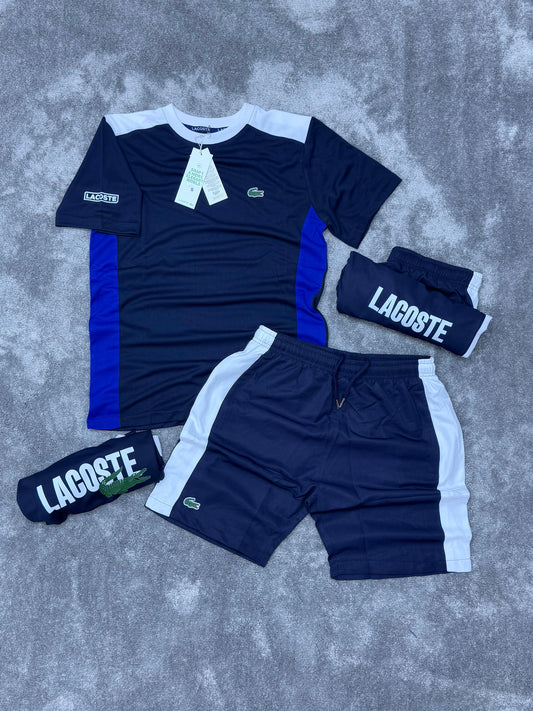 Conjunto corto lacoste azul marino logo verde detalles blancos