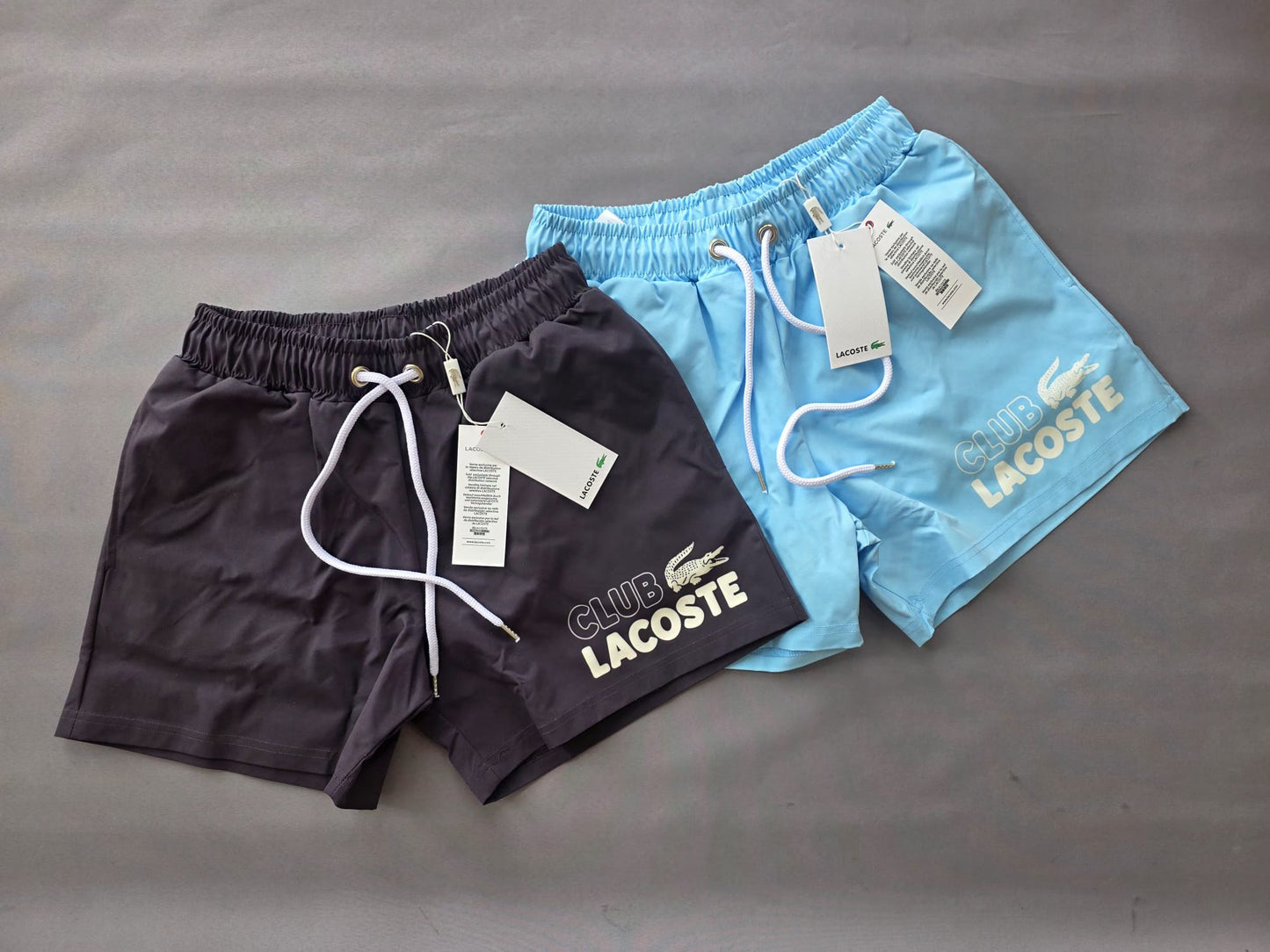 Bañador Lacoste azul logo blanco