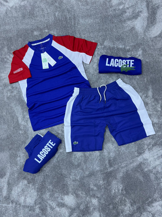 Conjunto corto lacoste azul logo verde detalles rojos