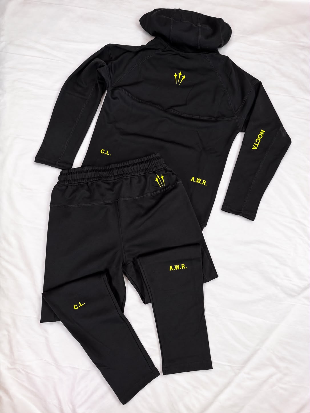 Chandal nike negro x NOCTA detalles amarillos