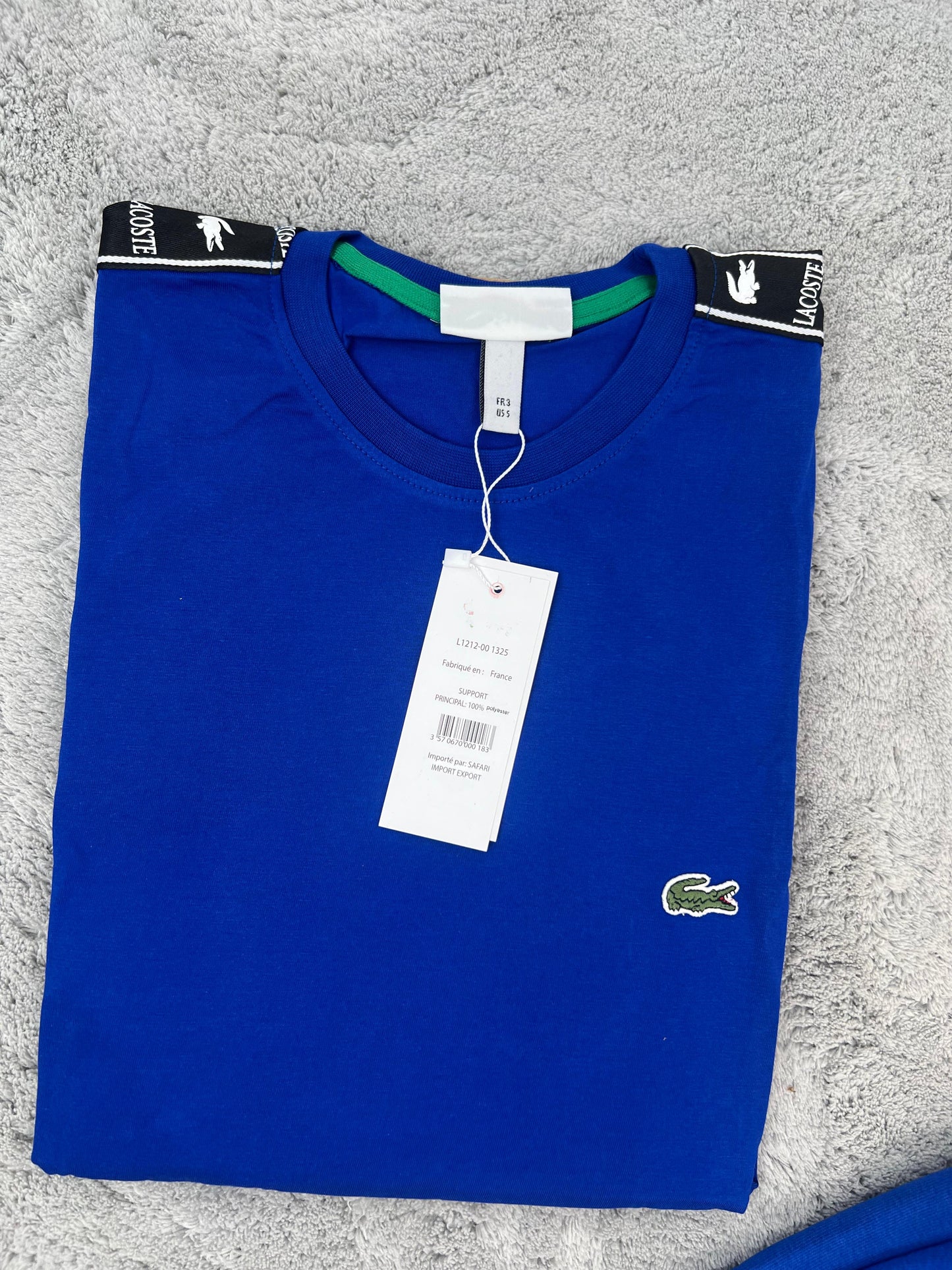 Conjunto corto lacoste azul logo verde lineas negras
