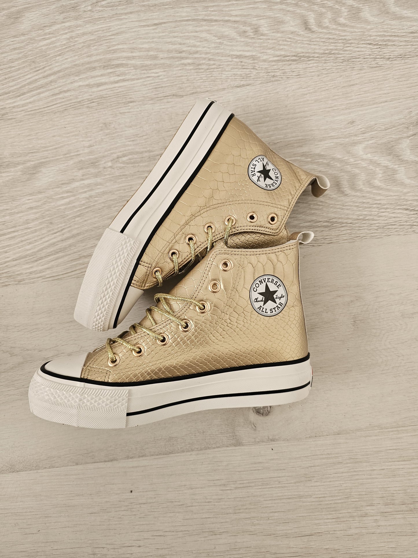 Convers oro cocodrilo