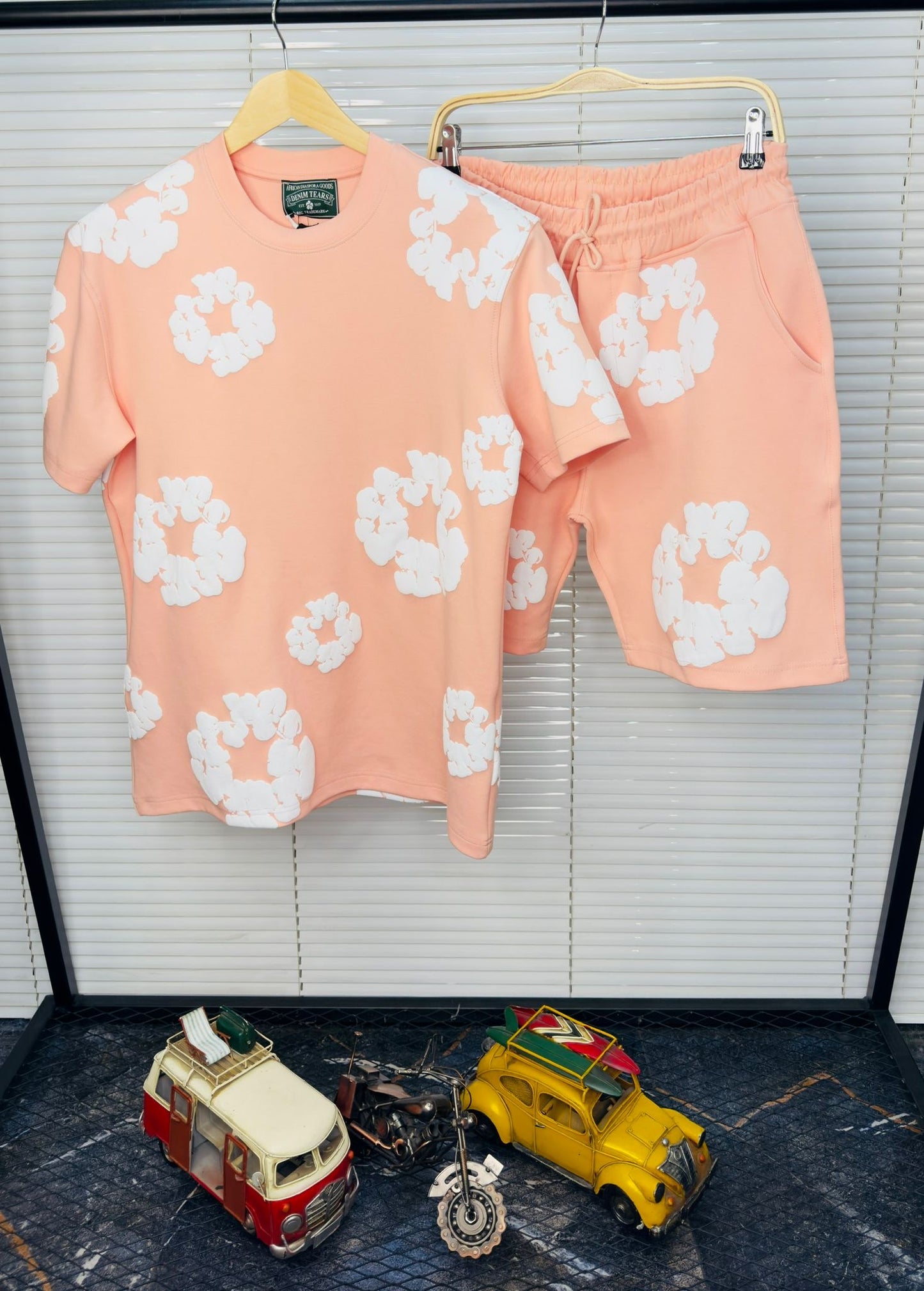 Conjunto DENIM TEARS rosa logo blanco