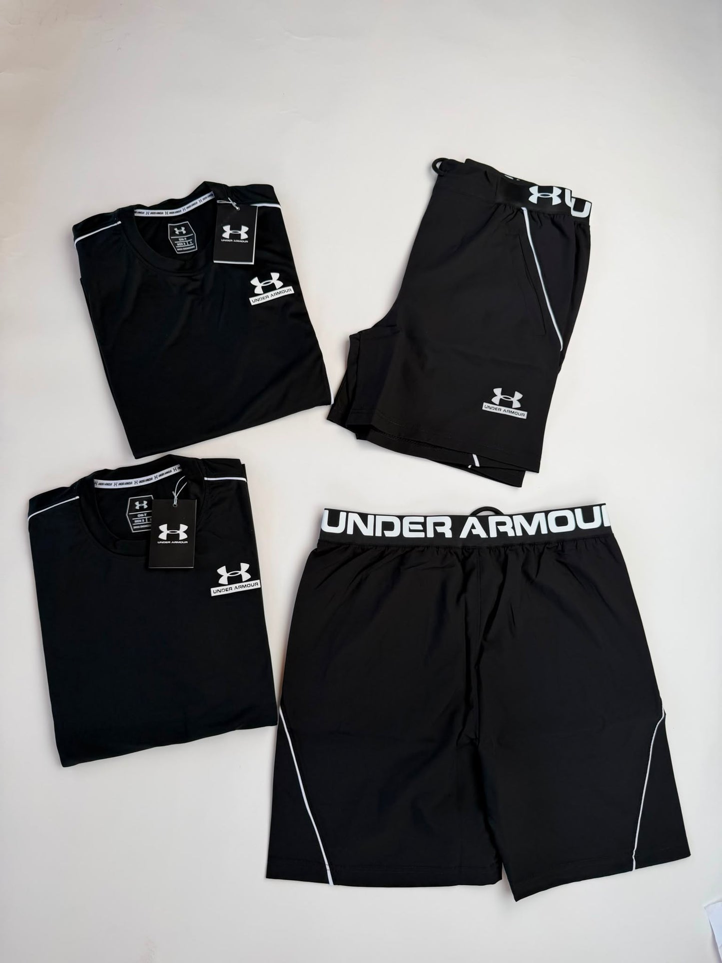 Conjunto corto under armour negro logo blanco