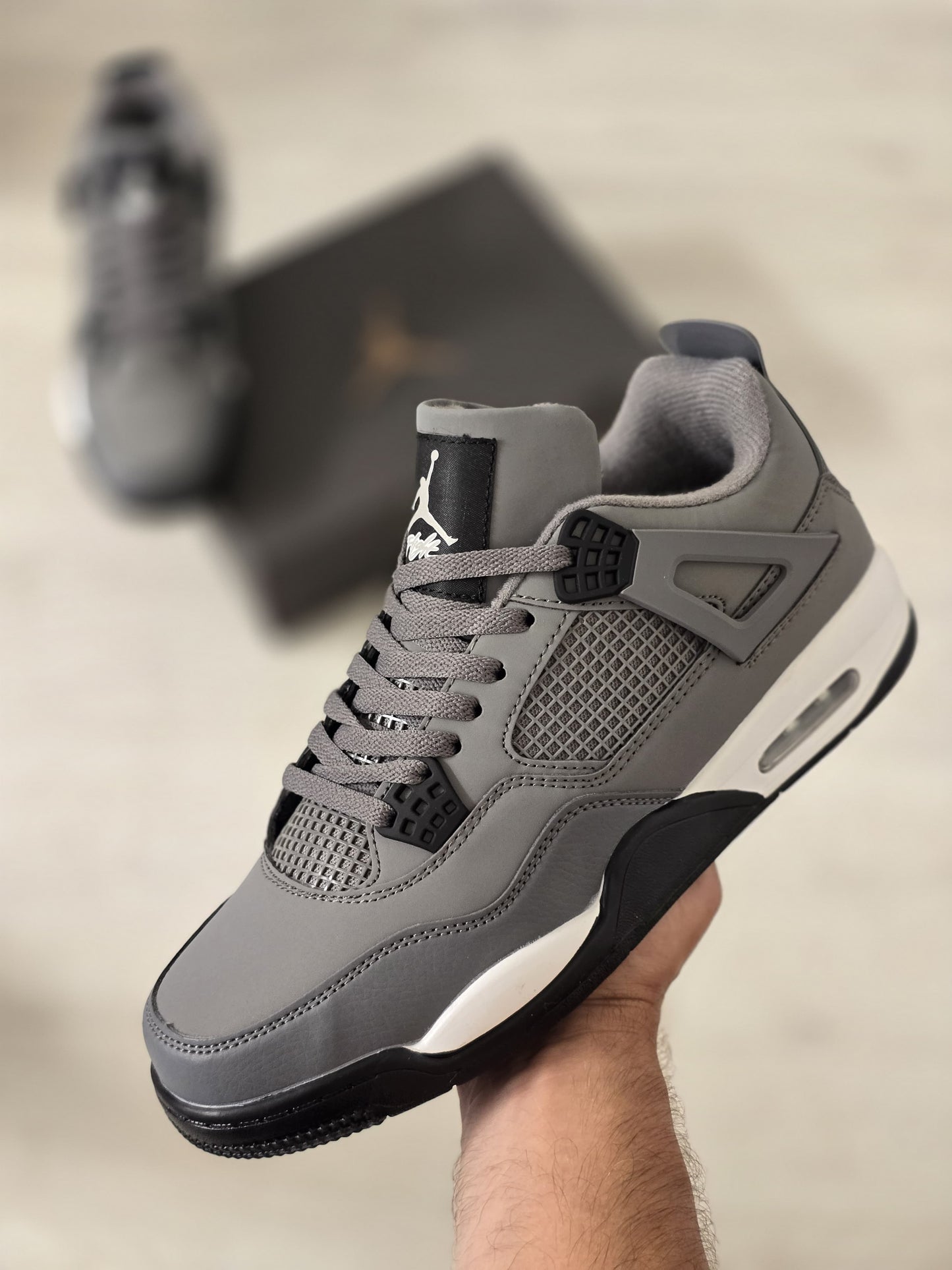 Jordan 4 gris