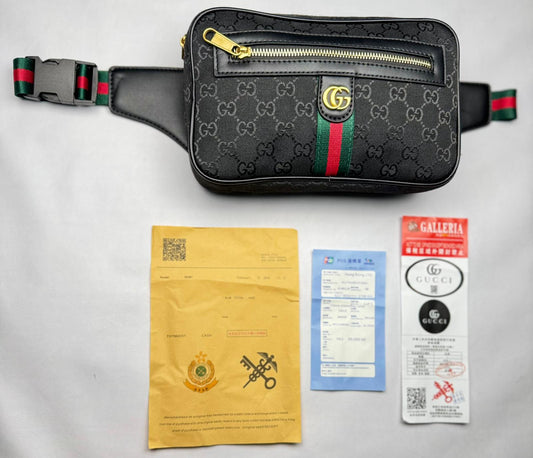 Riñonera GUCCI negro logo dorado detalles verdes y rojos