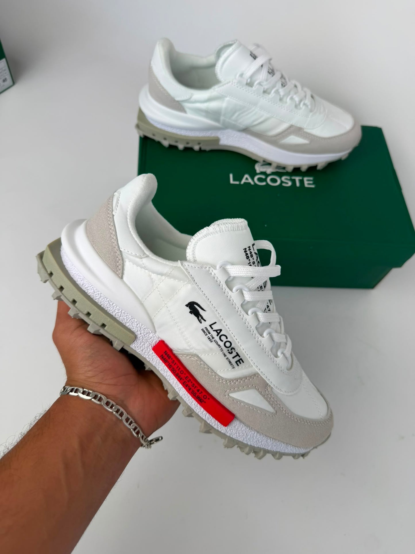 Zapatillas Lacoste Elite Active blancas logo negro detalles rojos