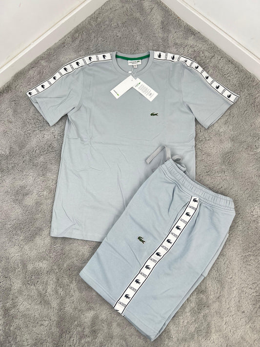 Conjunto corto lacoste gris logo verde lineas blancas