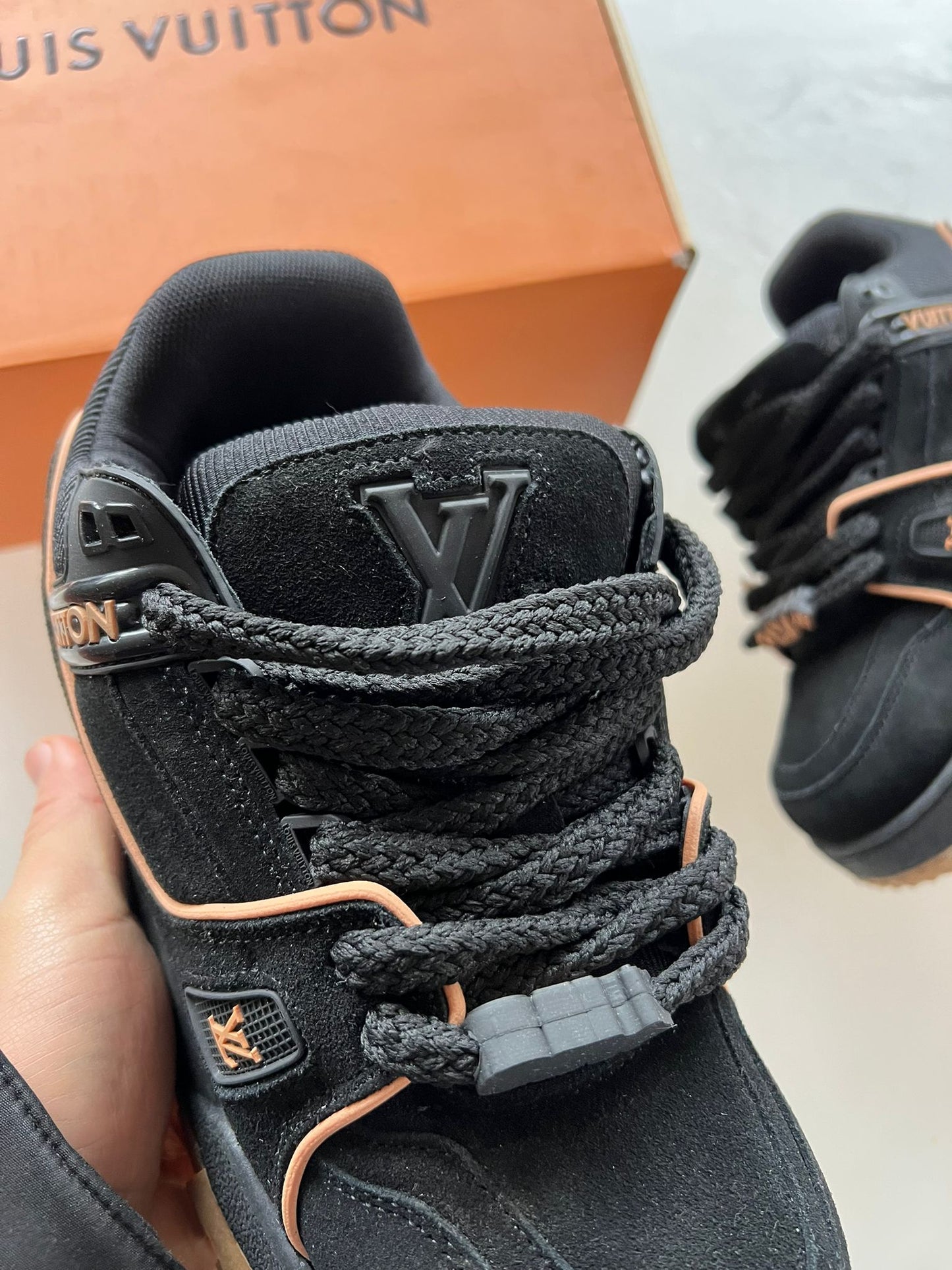 LV Trainer negras y marrones