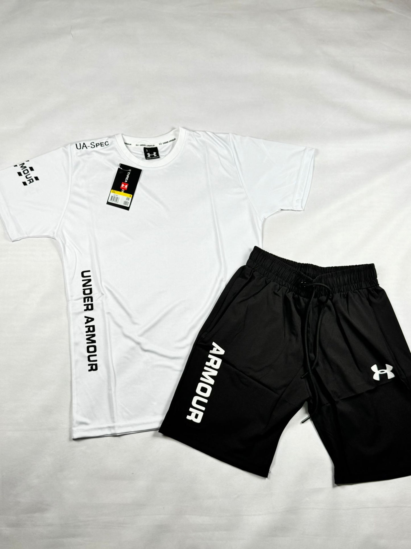 Conjunto under armour blanco logo negro