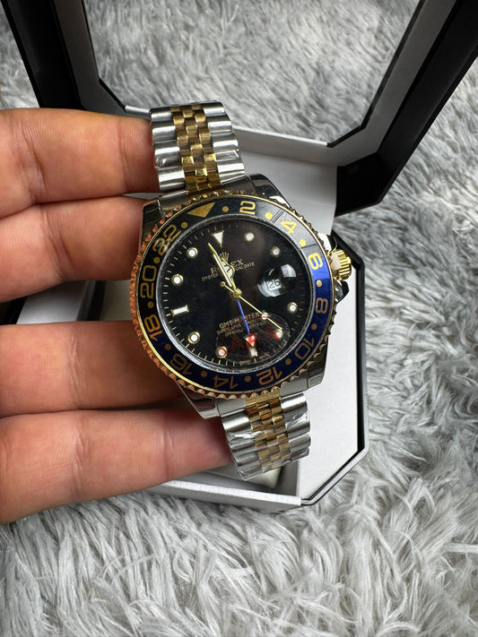 RELOJ ROLEX PLATEADO DETALLES DORADOS Y NEGROS