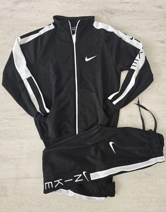 Chandals nike logo lateral negro blanco