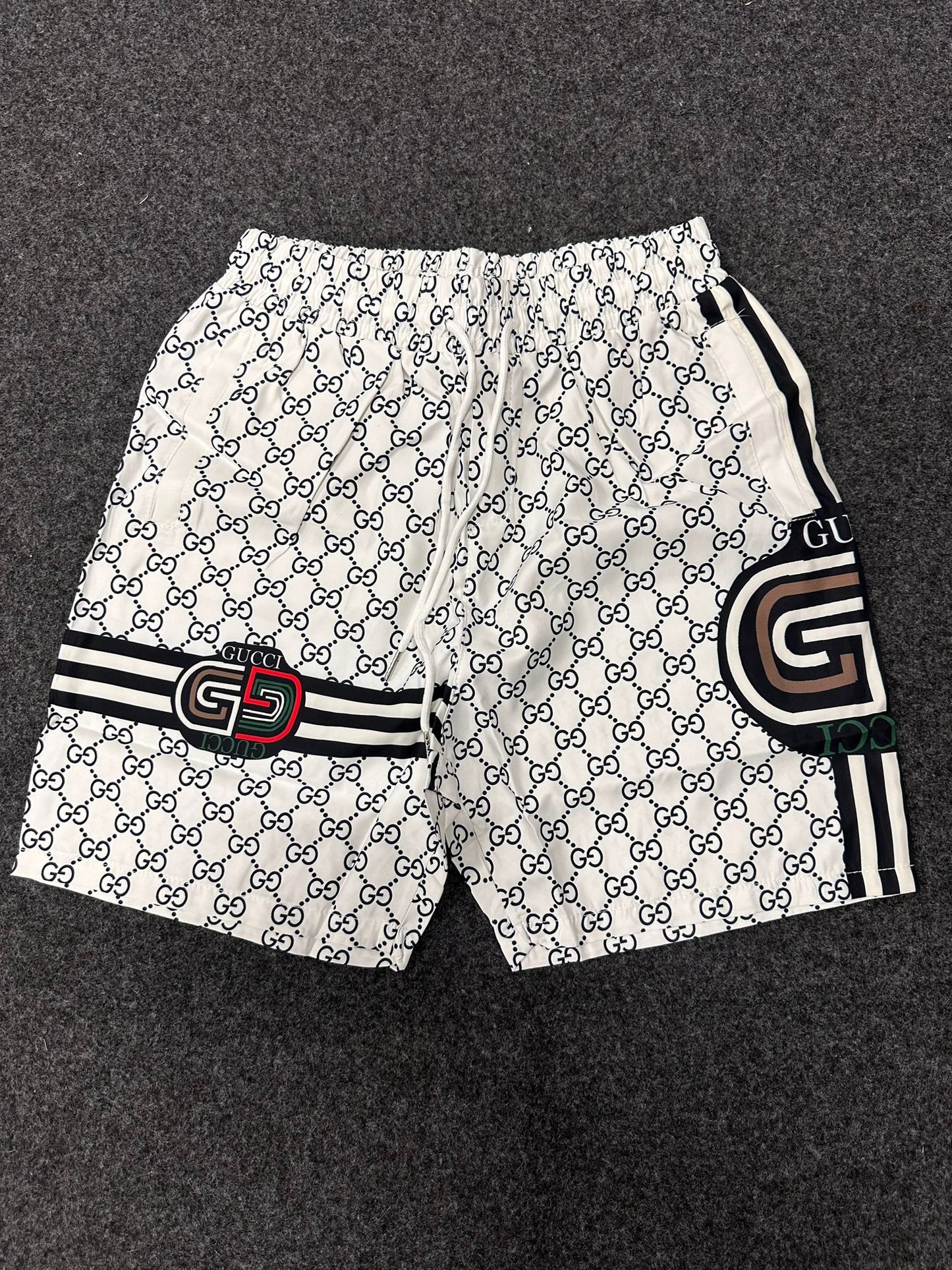 Bañador gucci blanco logos negros