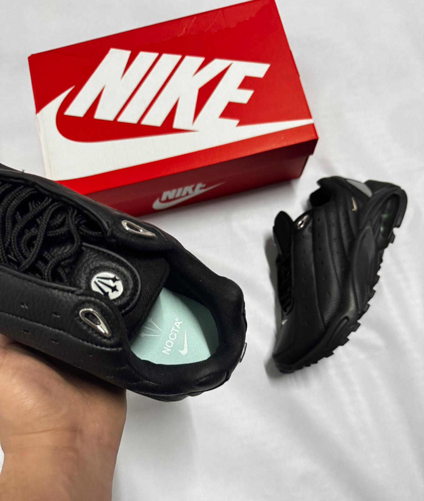 Nike nocta negro logo plateado