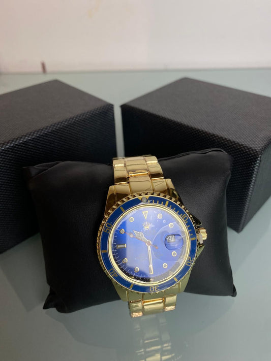 Reloj Rolex azul y dorado