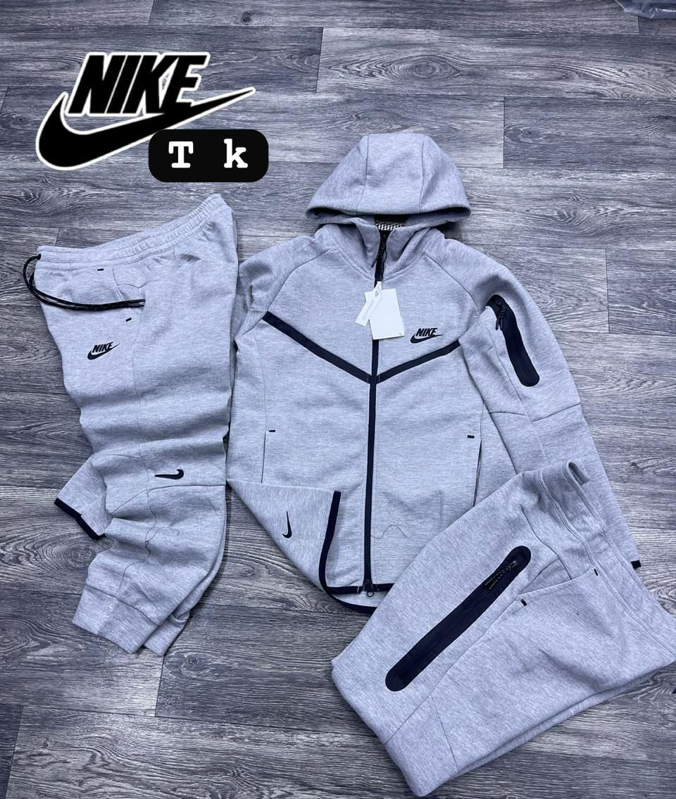 Nike tech gris logo negro