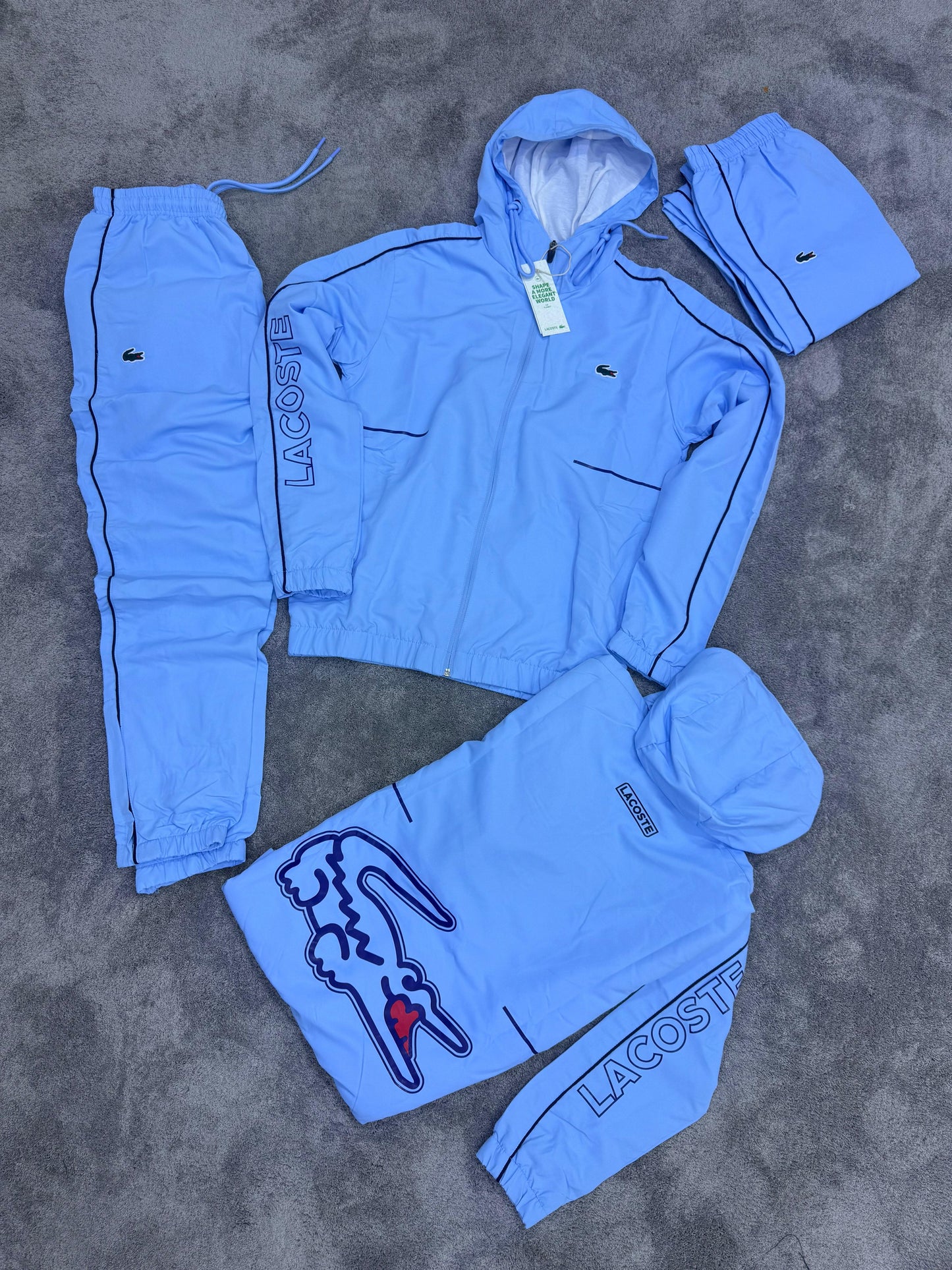 Chandal LACOSTE azul logo verde logo grande en espalda