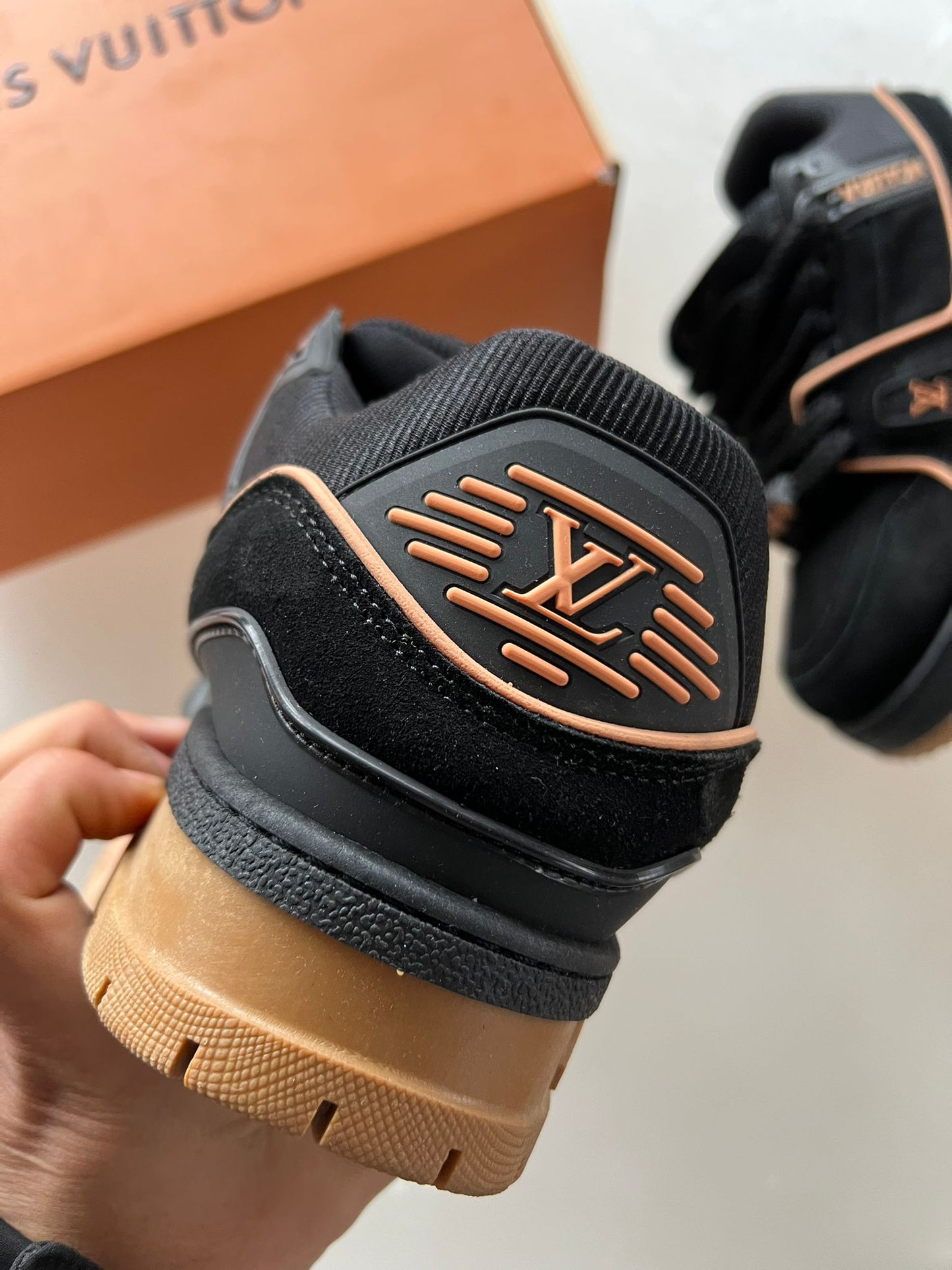 LV Trainer negras y marrones