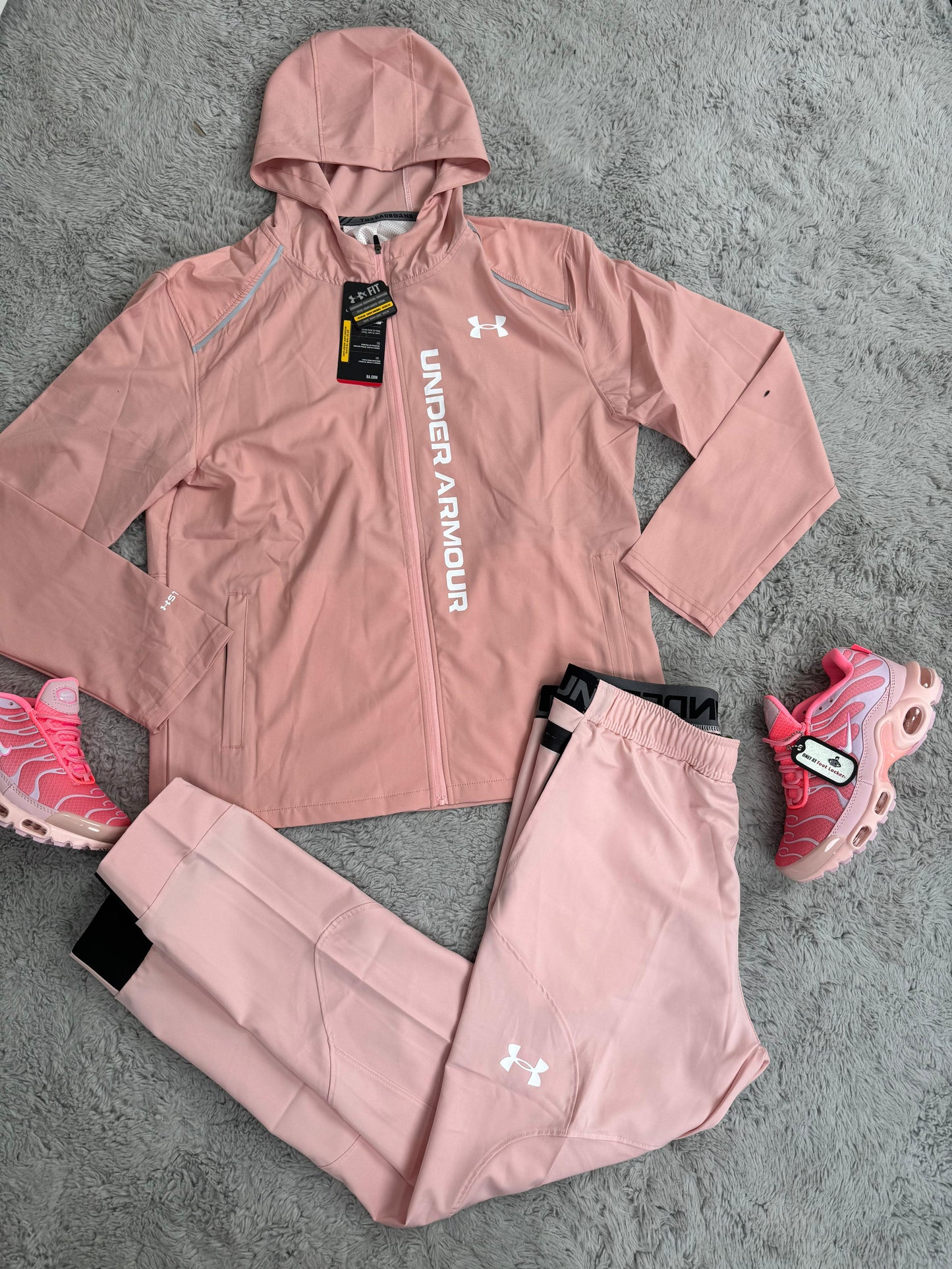 Chandal Under Armour rosa logo blanco