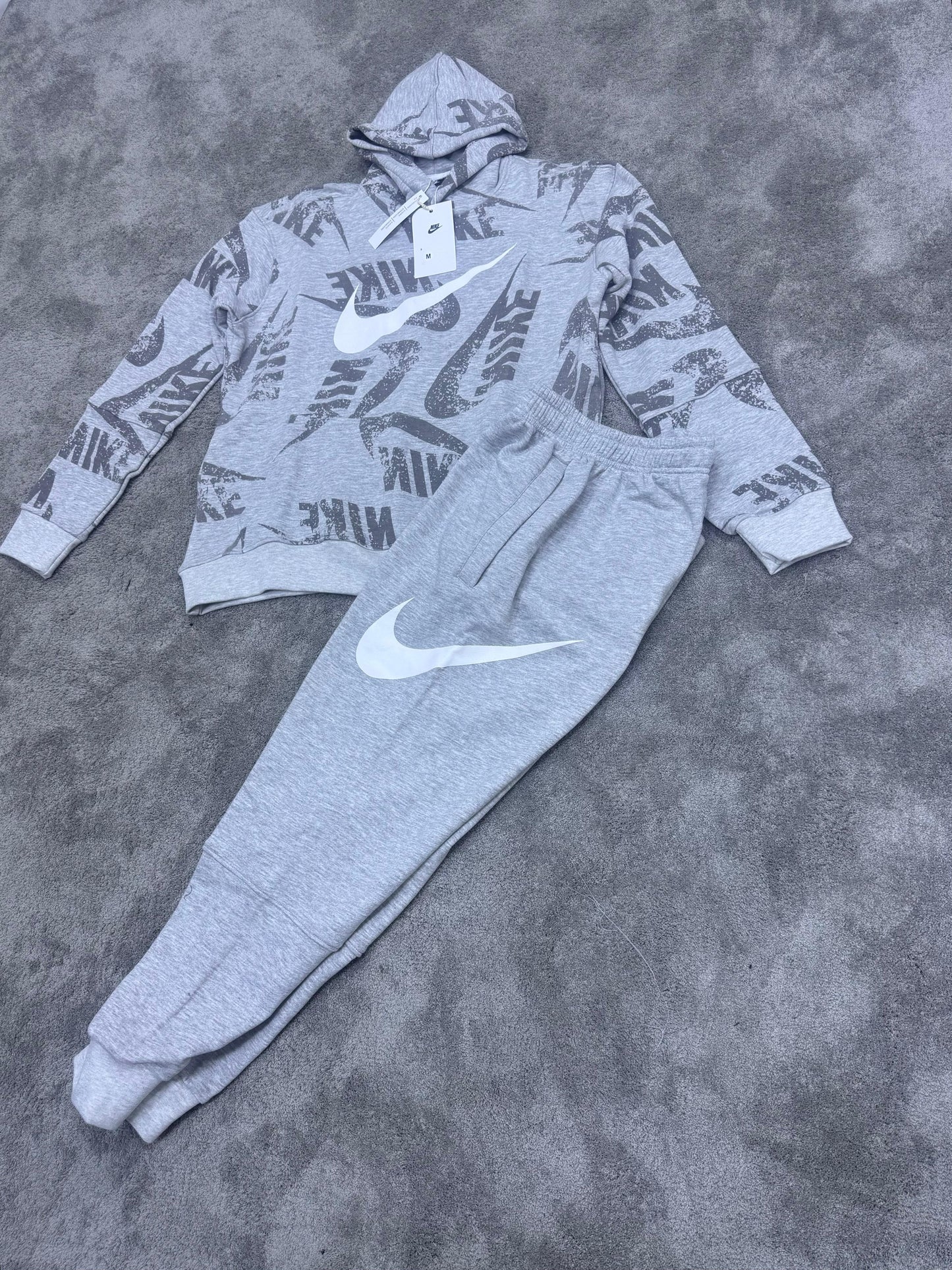 Chandal Nike gris logo blanco
