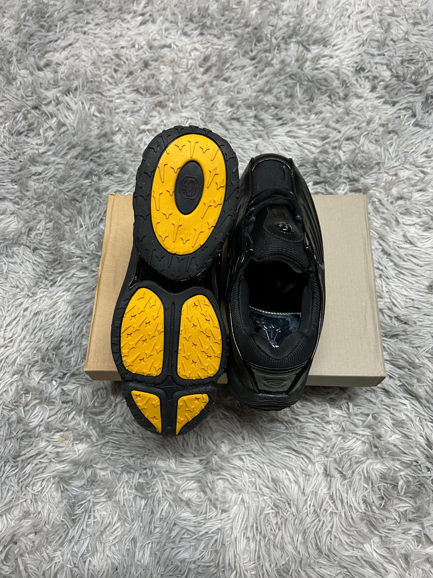NIKE NOCTA NEGRAS Y PLATA