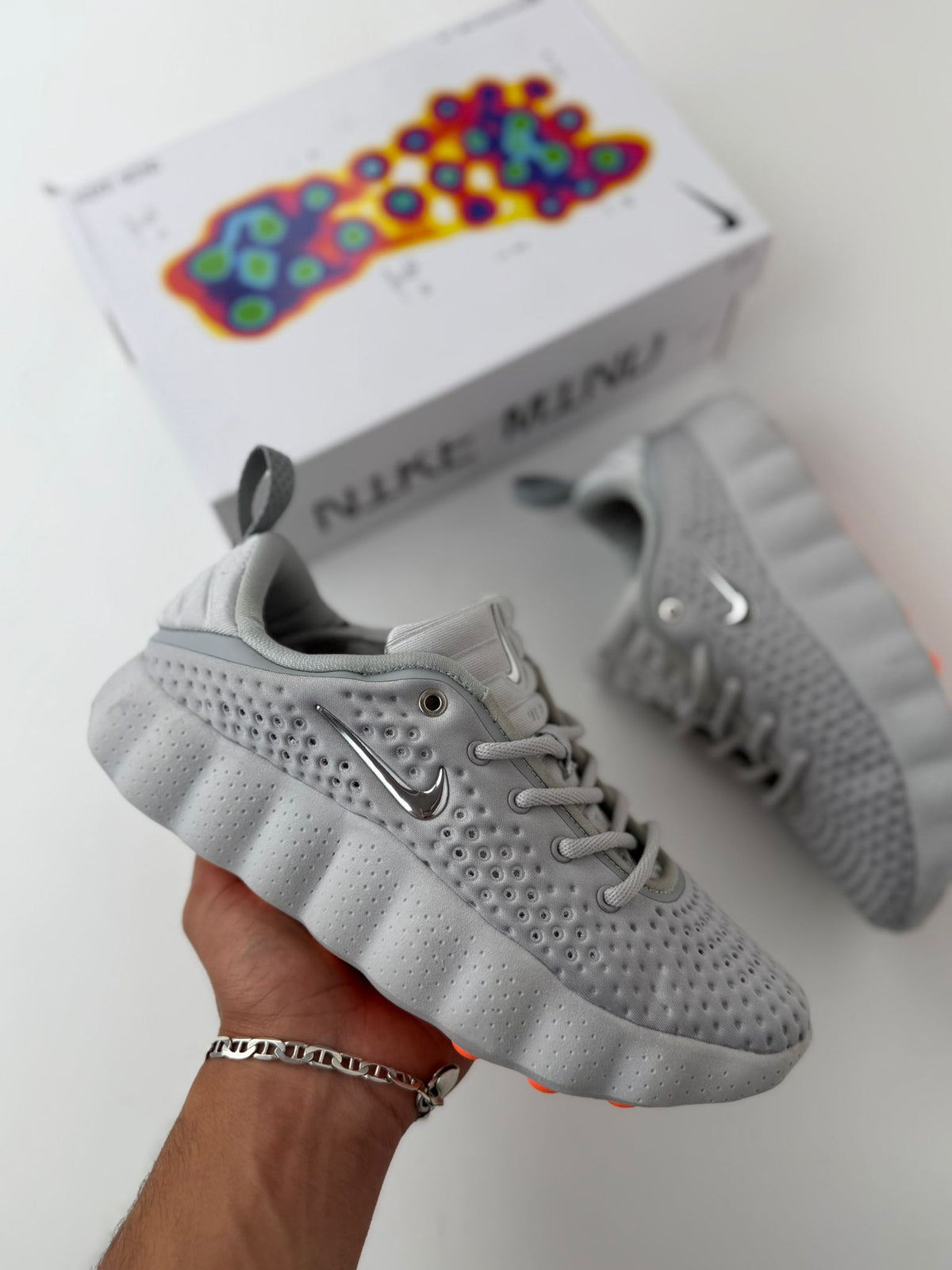Zapatillas Nike mind gris logo plateado