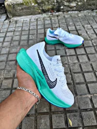 Nike ZOOMX VAPORFLY blanco logo negro detalles azules