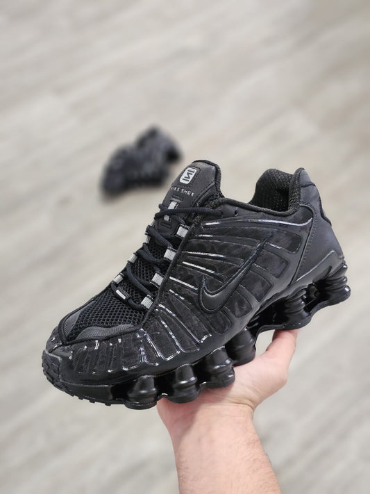 Shox negra logo plata